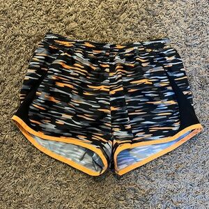Nike Women's Black and Orange Athletic Shorts